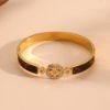 Picture of Titanium-steel micro-pave flower hollow-out lightweight luxury bracelet