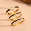 Picture of Titanium-steel micro-pave flower hollow-out lightweight luxury bracelet