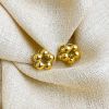 Picture of 18K gold-plated titanium huggies—florals, drops & geo studs