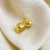 Picture of 18K gold-plated titanium huggies—florals, drops & geo studs