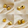 Picture of 18K gold titanium huggies—sphere, oval & heart trio