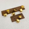 Picture of 18K gold titanium huggies—sphere, oval & heart trio