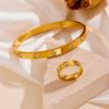 Picture of 18K gold-plated, hand-polished titanium-steel nail-bangle