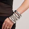 Picture of Polished, wide-curved sphere with minimalist metal vibe bangle in stainless steel