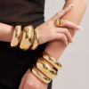 Picture of Polished, wide-curved sphere with minimalist metal vibe bangle in stainless steel