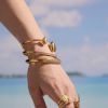 Picture of 18K gold plated triangle hollow flex Luxurious bangle