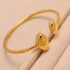 Picture of 18K gold plated triangle hollow flex Luxurious bangle
