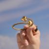 Picture of 18K gold plated triangle hollow flex Luxurious bangle