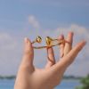 Picture of 18K gold plated triangle hollow flex Luxurious bangle